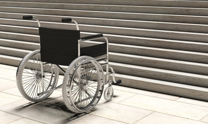 Wheelchair empty infront of concrete stairs. 3d illustration